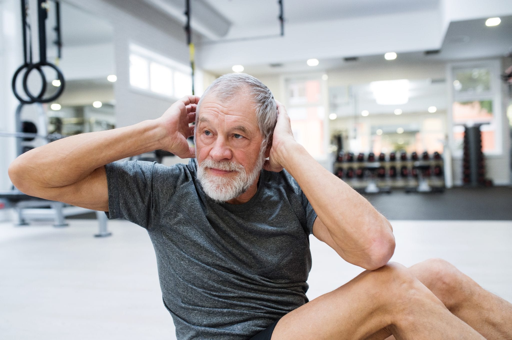 Elderly man doing his workout